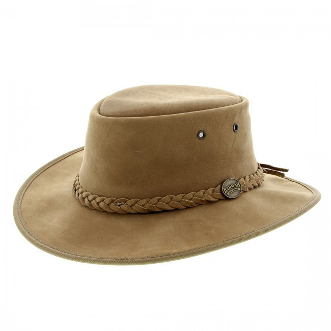 Light tan suede-look hat with braided band, round metal badge and crown eyelet